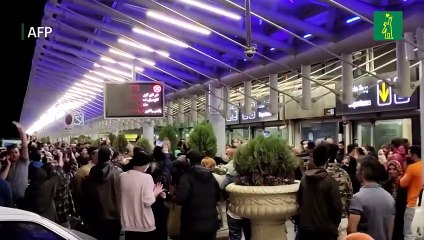 Una multitud recibe en Irán como una heroína a escaladora que compitió sin hiyab