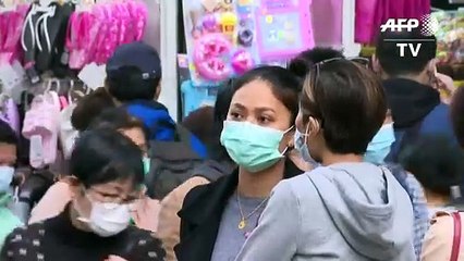 Ante la escasez, los hongkoneses se fabrican sus propias mascarillas
