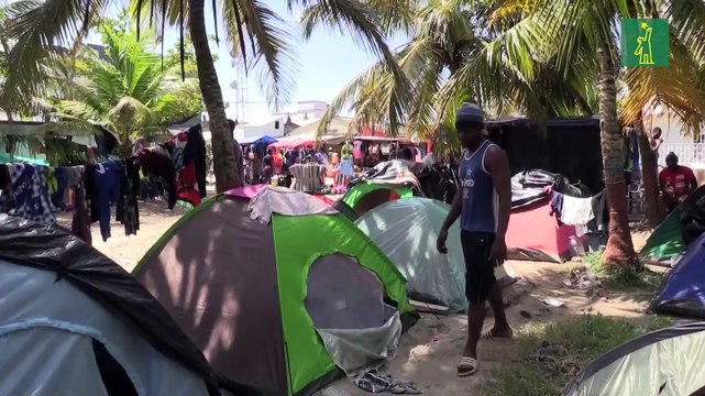 Miles de migrantes haitianos esperan su paso hacia el sueño americano en la frontera entre Colombia y Panamá