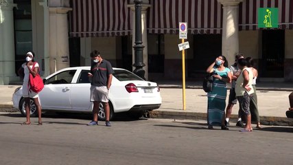 "Babalawos" cubanos pronostican enfermedades respiratorias y piden prudencia