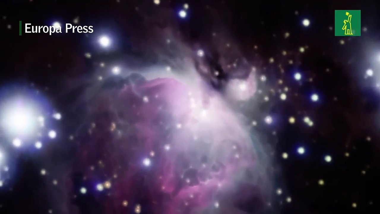 Un fósil de las primeras galaxias del universo, visto junto a Andrómeda