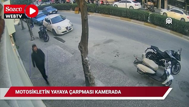 Motosikletin yayaya çarpması güvenlik kamerasında