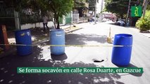 Se forma socavón en calle Rosa Duarte, en Gazcue