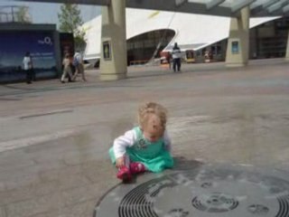 Mary plays with an O2 fountain