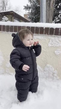Toddler Gets Shocked by Snowblower Blowing Snow in His Direction