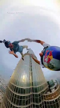 Daredevils base jump from 139th floor of Burj Khalifa