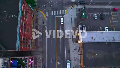 Aerial view over the Broadway street, revealing the Cumberland river in Nashville, USA - tilt, drone shot