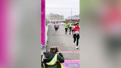 Man breaks world record for fastest marathon - on crutches
