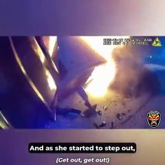 Police Breaks Window and Rescues Woman from a Burning Car in the U.S.