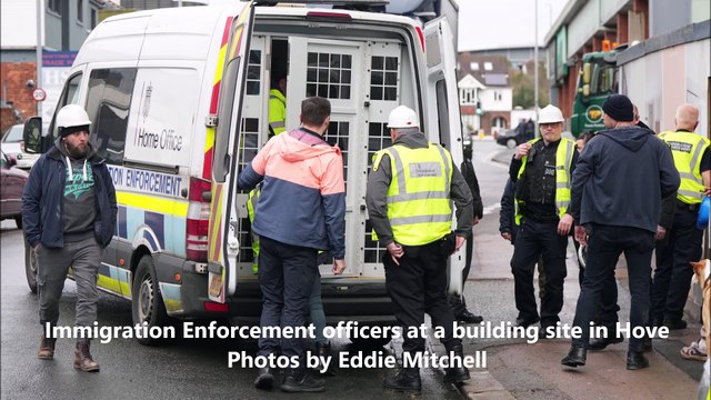 Immigration officers pictured at building site in Sussex