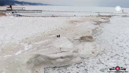 Walking on shelf ice over frigid Lake Michigan