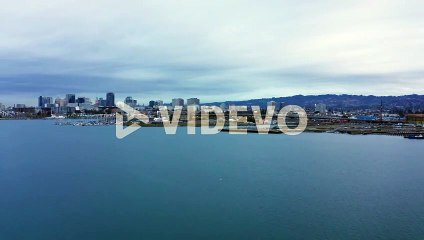 Sunrise clouds over the dark waters of the bay morning