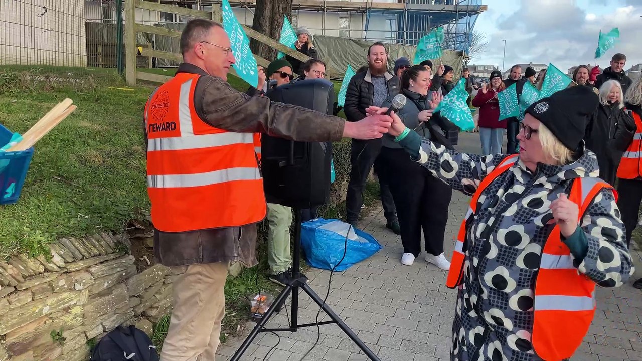 Martin Dixon, the president of Cornwall and Isles of Scilly NEU and Head of year Sue Ollerenshaw, who is also the NEU representative at Newquay Tretherras address the picket line