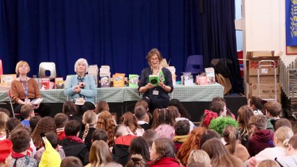Bookery volunteers read books from the collection to pupils (Will Goddard, Crediton Courier)
