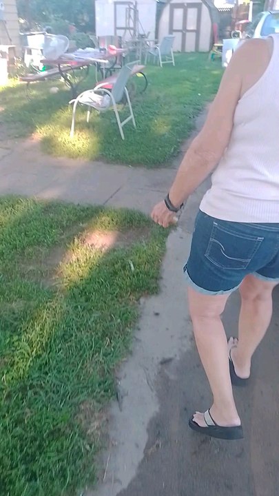 granny falls to feed the squirrel by hand