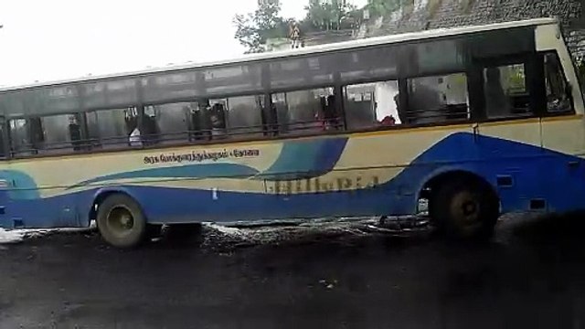 Experienced Dhimbam ghat bus driver patiently wait for struggling truck driver_Hills Driving