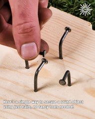 Using just nails to hold a round object in place 🔧