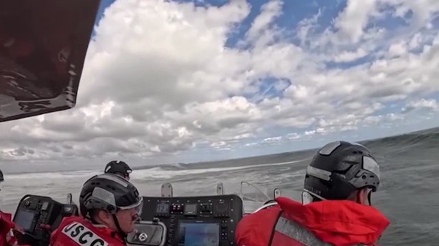 US coast guard tackles huge waves following Hurricane Erin