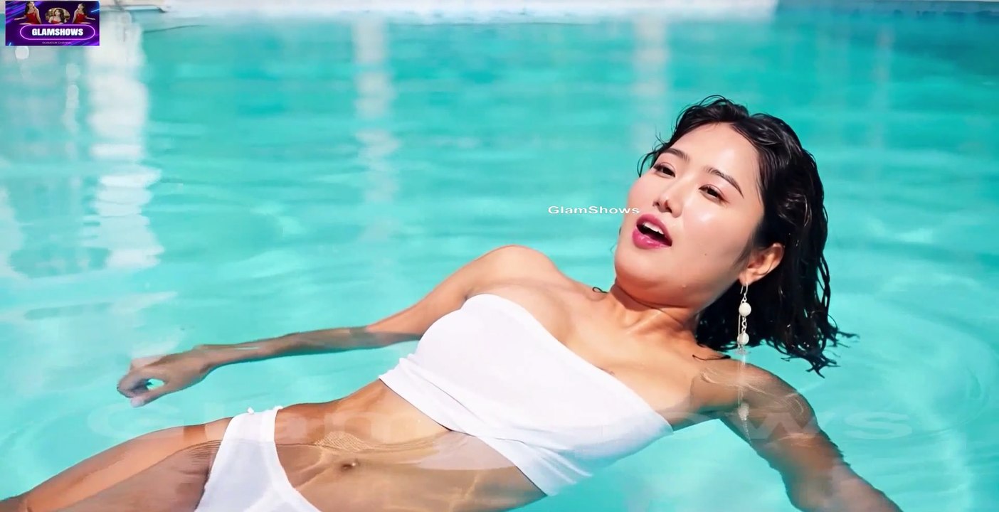 Beautiful Girl Swimming In Pool - GlamShows
