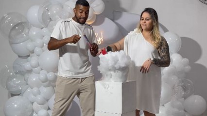 Purple smoke sparks a huge celebration at gender reveal party