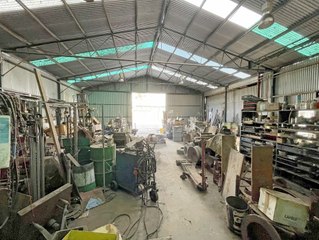 Town's trucking workshop for sale with lot of tools/parts.