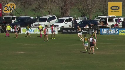 Ryley Sharp kicks the first goal of the game