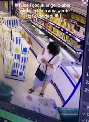 Markette tuvaletini yapan kadın görüntülendi