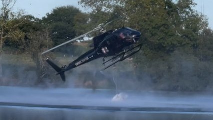 Un hélicoptère bombardier d’eau s’écrase dans un étang, l’équipage sain et sauf