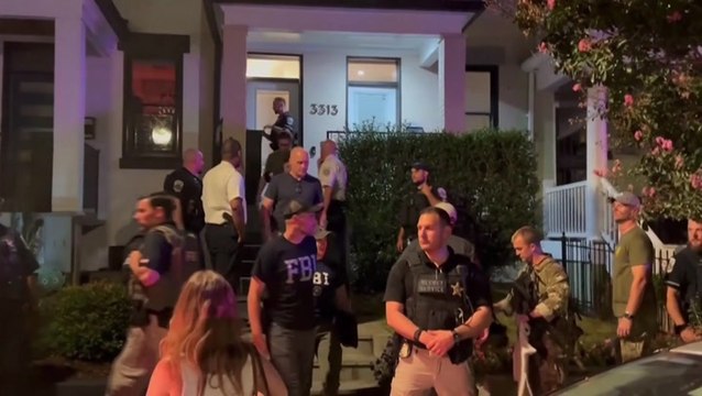 Protesters confront federal agents in D.C. after National Guard troops seen armed with guns