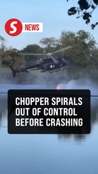 Firefighting helicopter crashes into pond while collecting water in France