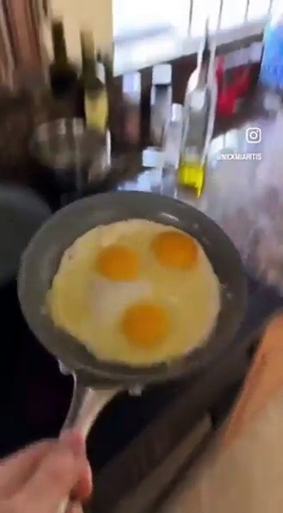 Man flips more and more eggs