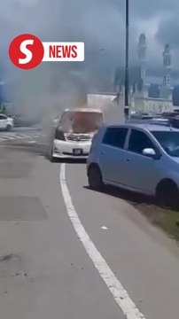 Four cars engulfed in flames near Kota Kinabalu City Mosque during Friday prayers