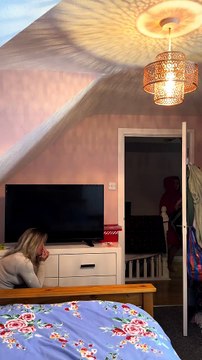 Woman Hides in Her Friend's Room and Suddenly Shouts to Scare Her