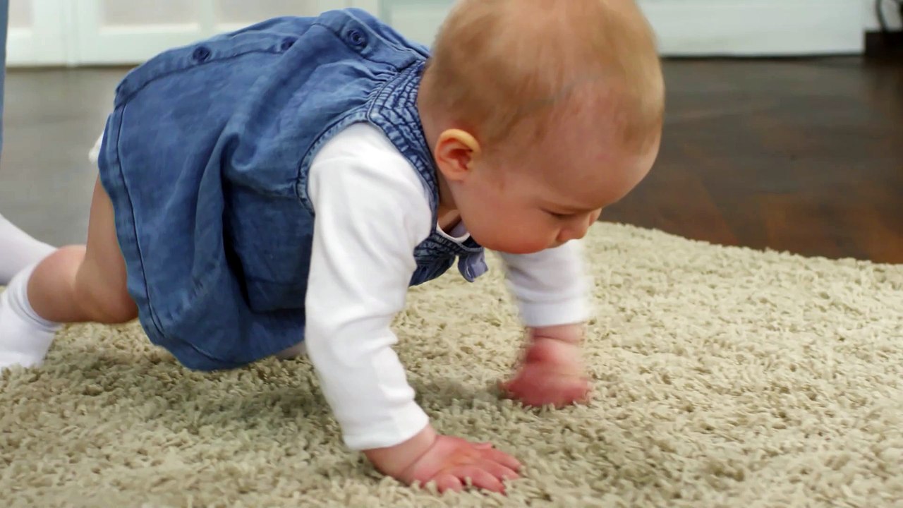 baby walking on floor