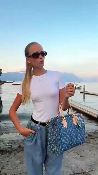 The girl with no personality is doing a little outfit vid