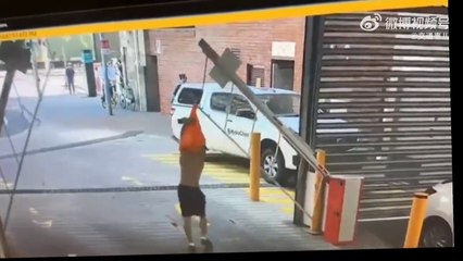 Automatic car park barrier undresses guy