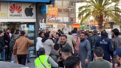 Syria security forces disperse rival protests in Damascus