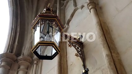 Vintage street lamp hanging in the Westminster Abbey exterior facade