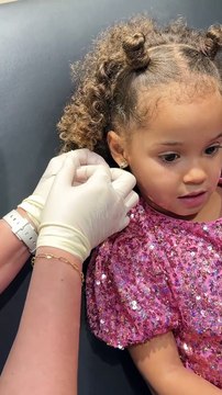 Adorable First Piercing: Tiny Ears, Big Memories! 💖 #babypiercing #firstpiercing #cutemoments #dubai