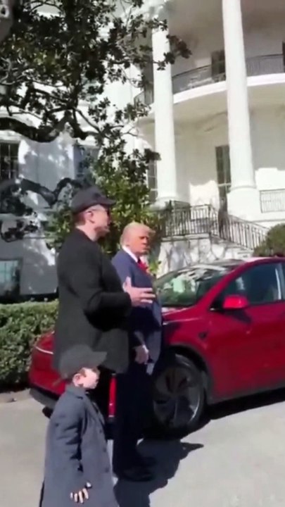 Donald Trump with Elon Musk and his kid advertising Tesla outside the White House!