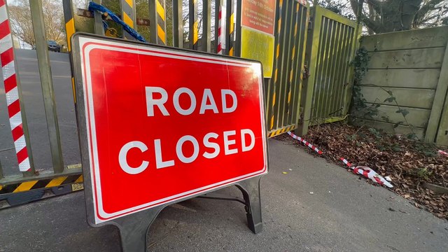 Residents are divided over the closure of a 'godsend' link road after developers were forced to close it due to a breach of planning conditions
