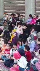 إمام مسجد بالدقهلية يجمع أطفال قريته في مسيرة للذكر وتلاوة القرآن