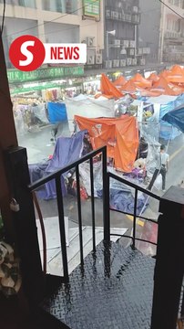 Severe downpour wreaks havoc and damaged tents of Ramadan bazaar traders on Jalan TAR