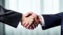 vecteezy_a-handshake-between-two-business-professionals-sealing-a_48567284 (1) (online-video-cutter.com)
