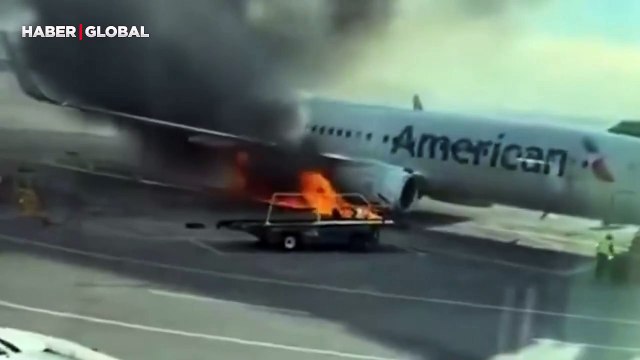 ABD'de yolcu uçağı alev aldı: Yolcular kanattan tahliye edildi