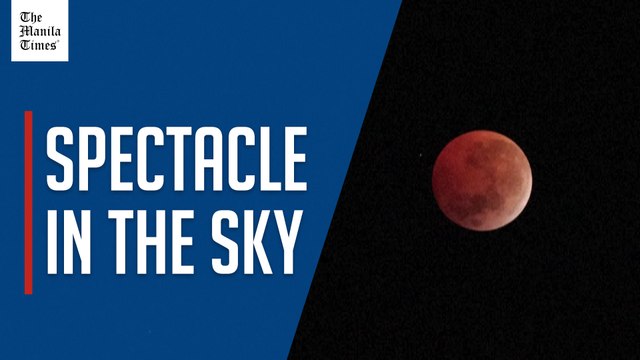 Stargazers marvel at 'Blood Moon' during total lunar eclipse
