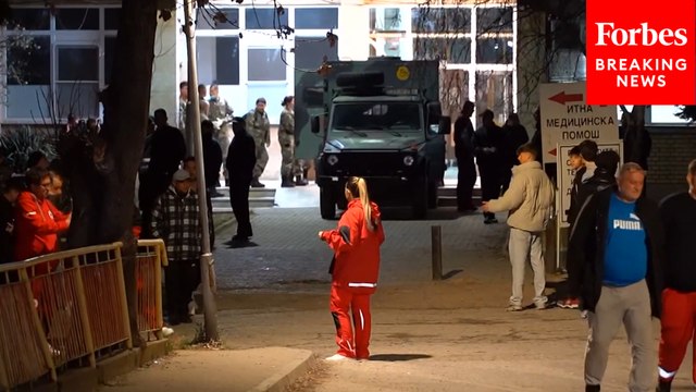 Relatives Wait Outside Hospital Where Victims Of North Macedonia Nightclub Fire Were Taken