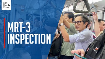 Dizon checks MRT-3 service, rides train
