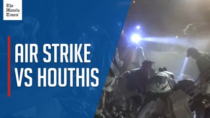 People search the rubble after a US air strike on Saada, northern Yemen