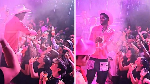Lil Nas X Pours Shots Down Fans' Mouths at Album Release Party